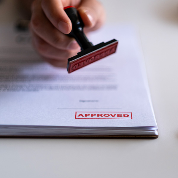 Business Man Stamping With Approved Stamp On Document