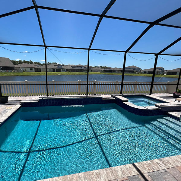 Beautiful new pool in the backyard with a hot tub in Lithia, FL