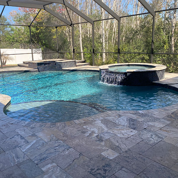 New pool in the backyard with a hot tub in Lithia, FL